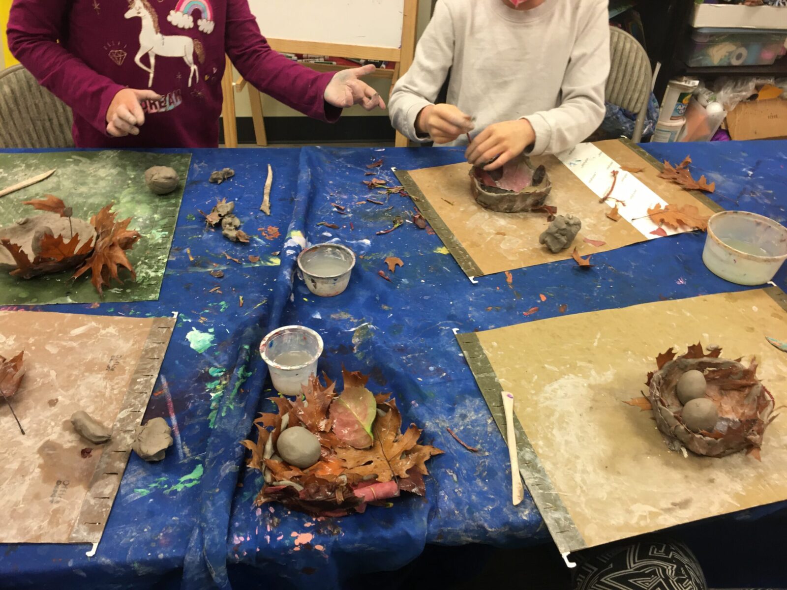 Kids making crafts using clay