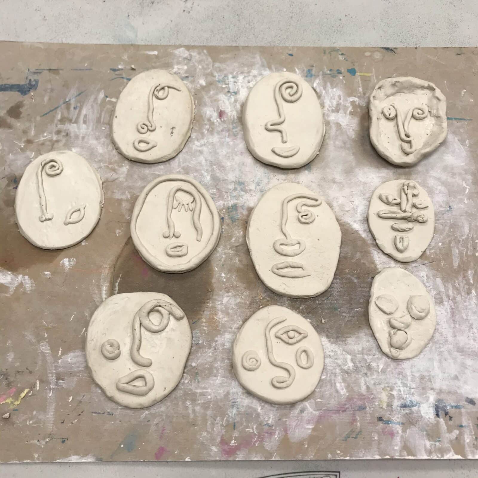 Different type of faces made from clay